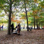 Students in the sculpture garden in the fall.